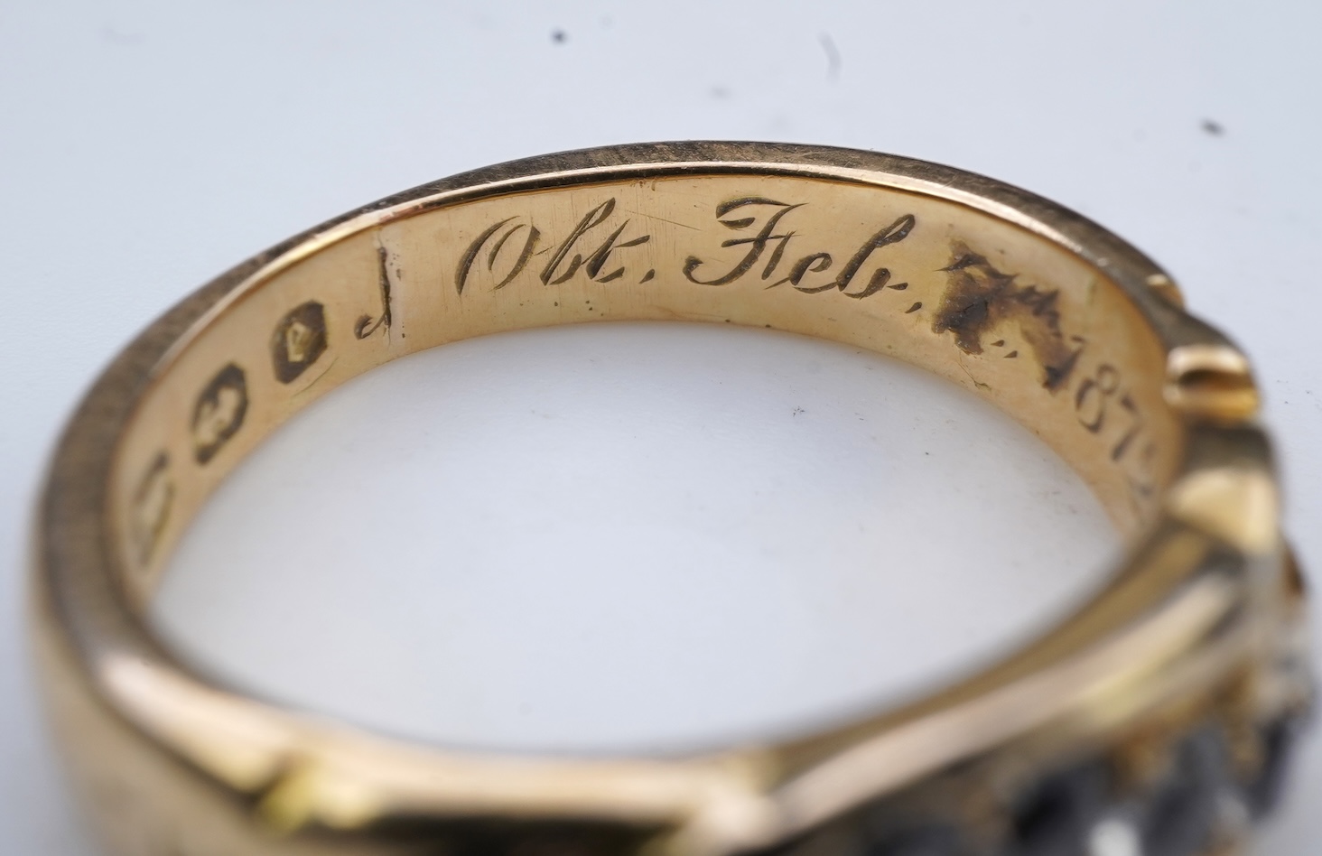 A Victorian enamel and diamond mourning ring, circa 1872